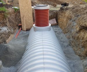 Obsyp nádrže a zásyp kanalizácie pieskom